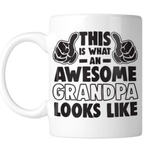 White mug with “This Is What an Awesome Grandpa Looks Like” with flexed arms, handle on the left