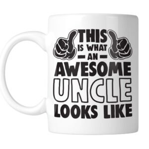White 11oz mug printed “This Is What an Awesome Uncle Looks Like” with flexed arms, handle on the left