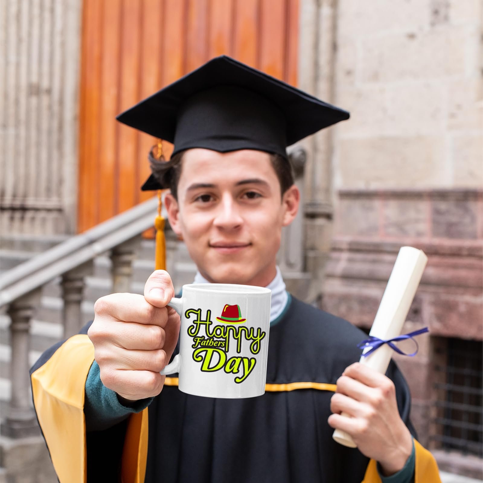 1bade6cf.jpg Graduate holding the Father's Day mug
