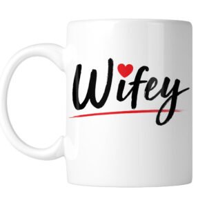 White mug with “Wifey” in black script with a little red heart, handle on the left