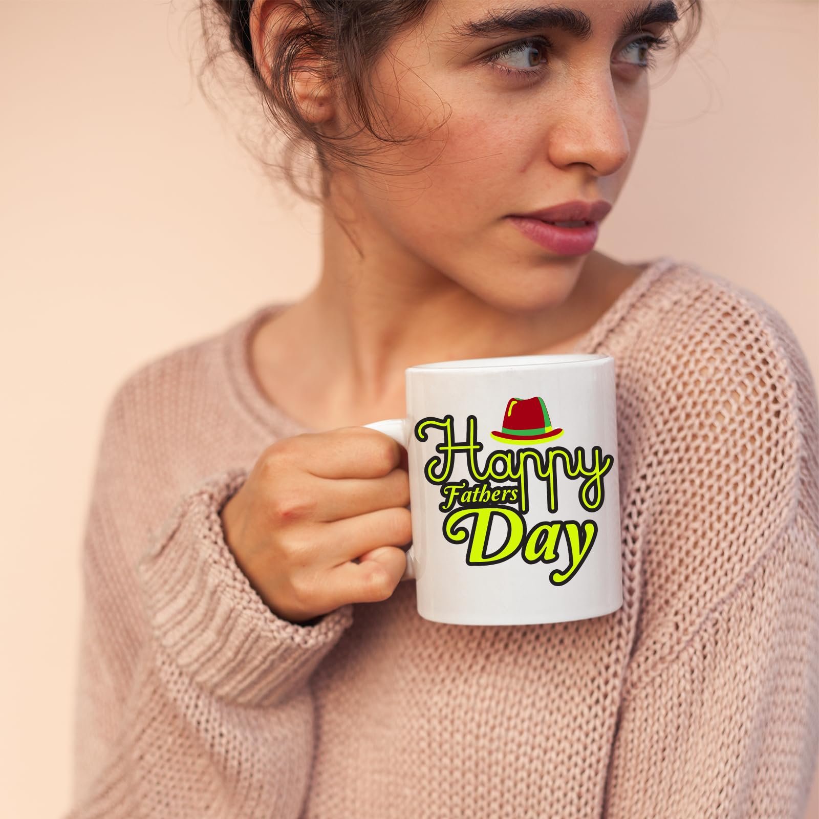 35436b19.jpg Woman sipping from the Father's Day mug