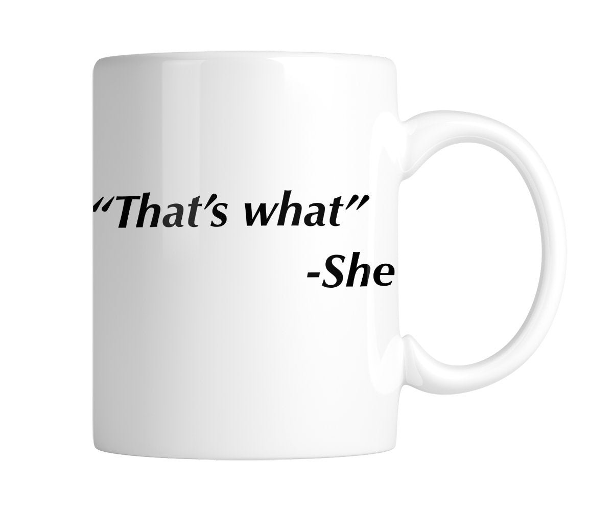 4335cafc.jpg White mug printed with “That's what” – She in black italic text, handle on the right
