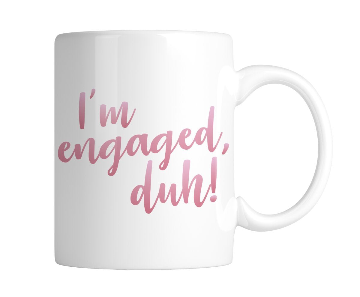 4f129dcc.jpg White mug with “I'm engaged, duh!” in pink script, handle on the right
