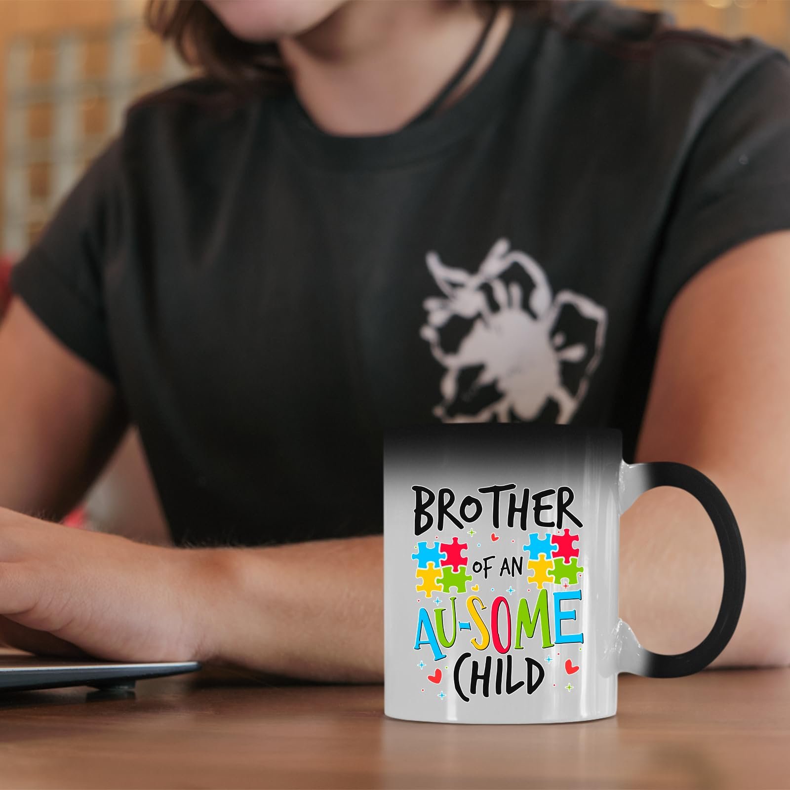 61il8ivmytl.jpg Brother of an Au-Some Child colour changing mug on a desk beside a laptop