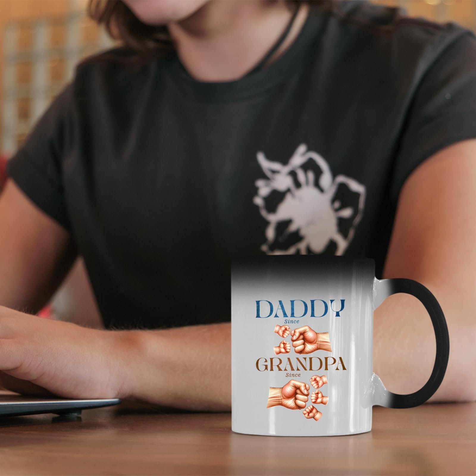 61nbbxentrl.jpg Daddy and Grandpa fist bump colour changing mug on a desk beside a laptop