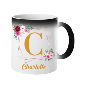 Colour changing mug revealing a gold initial in a floral frame and an example name
