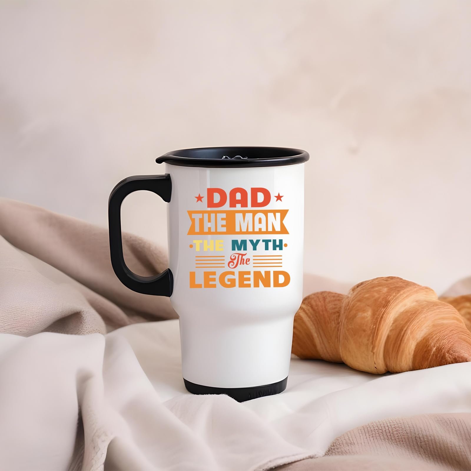 61pfzkcdpml.jpg Dad the Man retro travel mug on a soft blanket beside a croissant