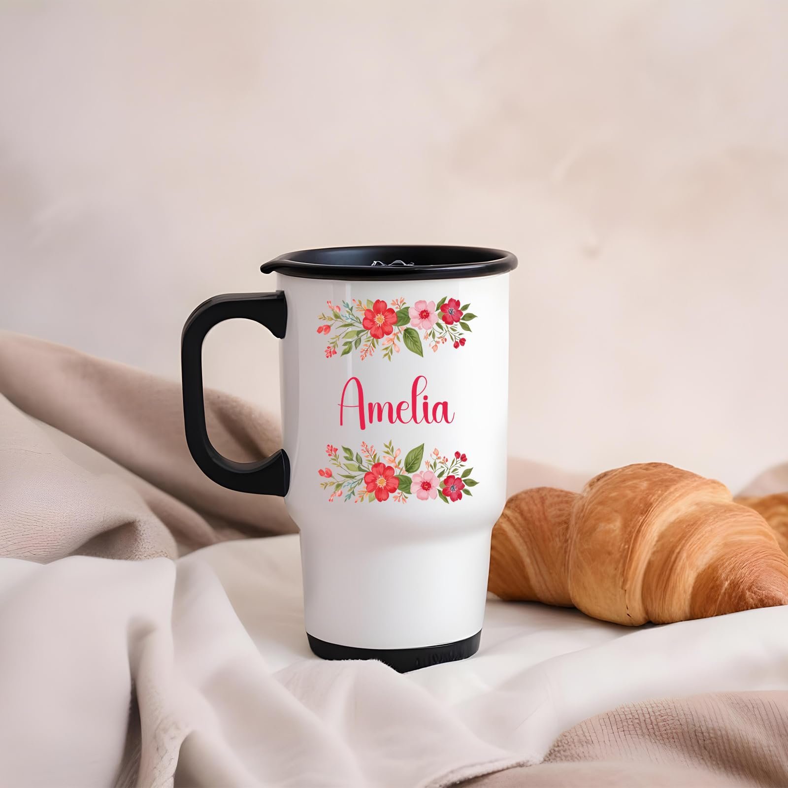 61qsziavqxl.jpg Travel mug with a red flower border around an example name on a blanket next to a croissant