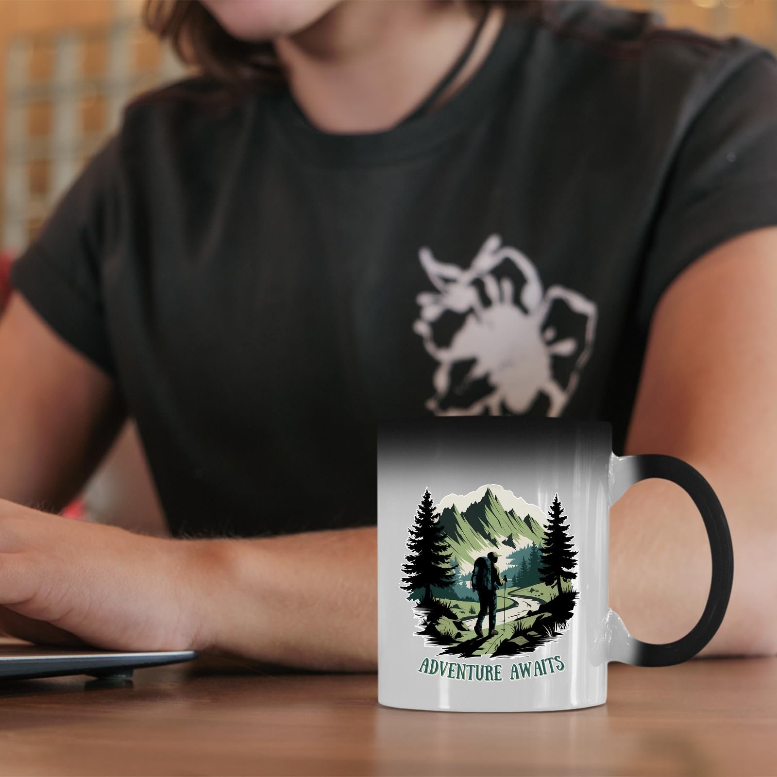 61ve2mpkaol.jpg Adventure Awaits hiker colour changing mug on a desk beside a laptop