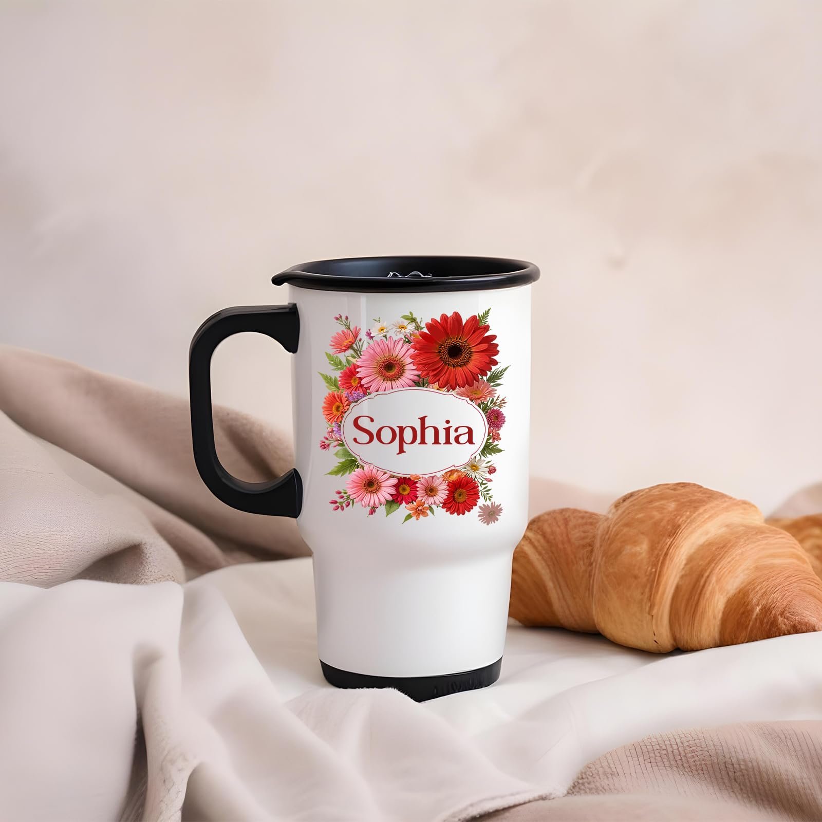 61wx ekoswl.jpg Travel mug with a red gerbera wreath around an example name beside a croissant