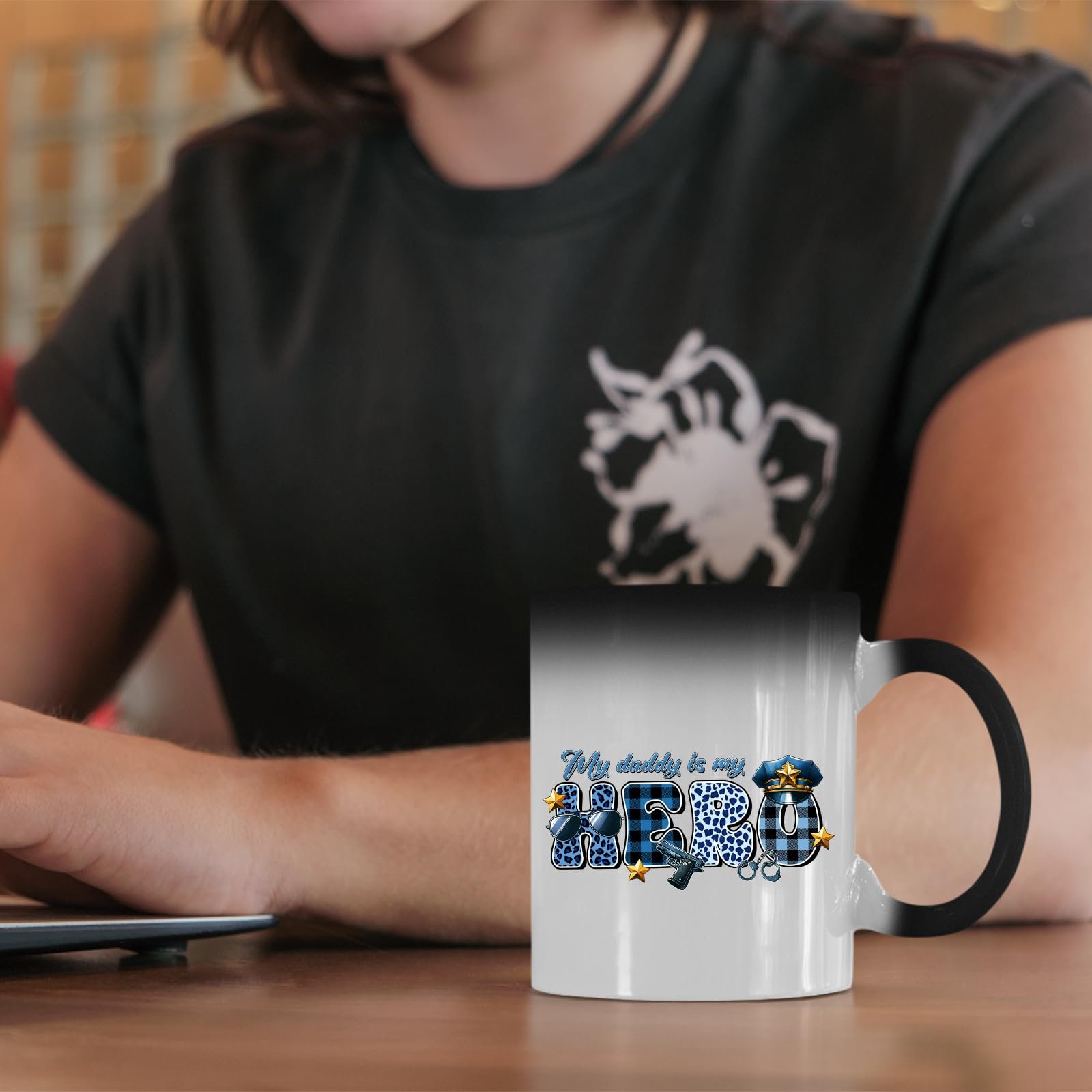 61zd8v1wlzl.jpg My Daddy Is My Hero police colour changing mug on a desk beside a laptop