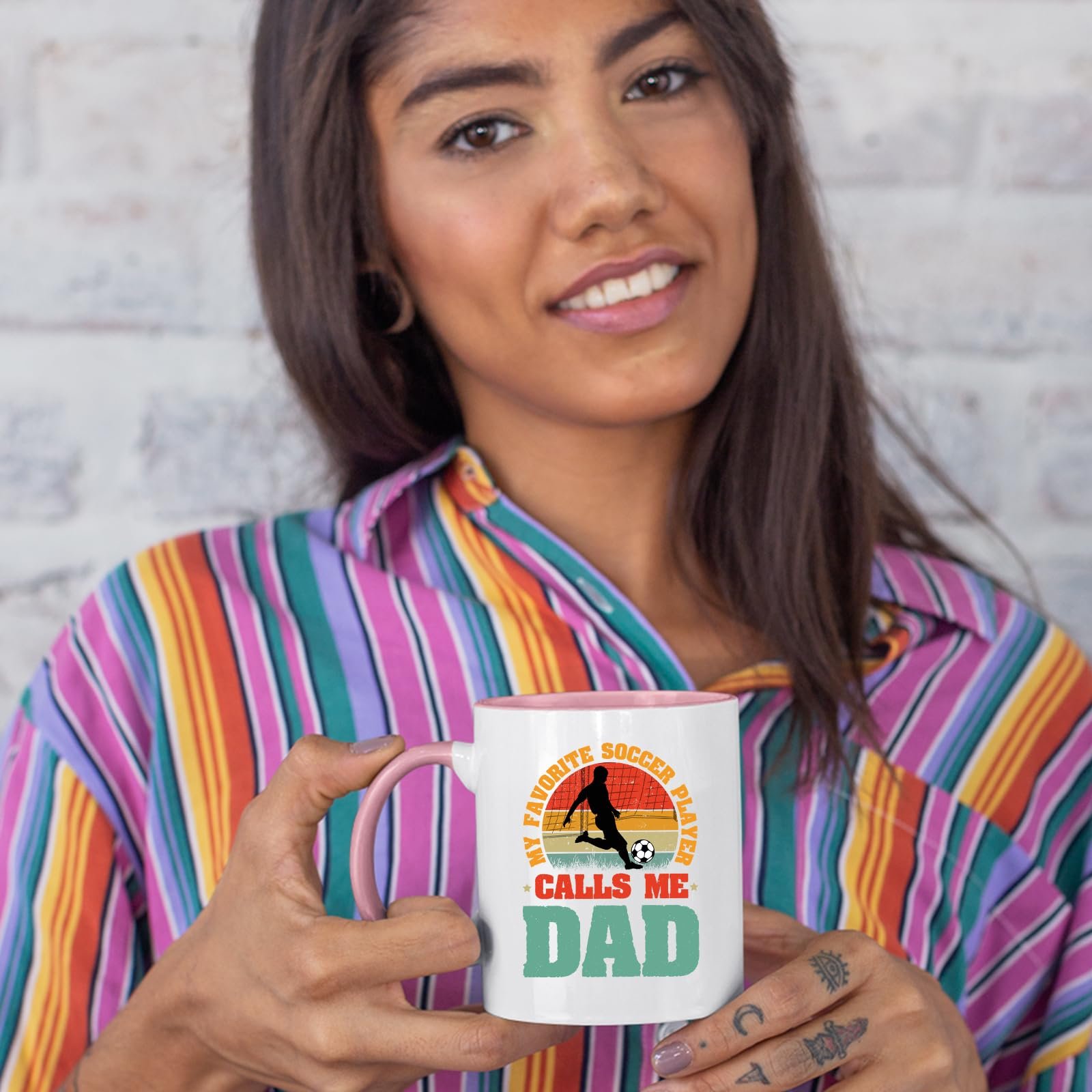 711bwvb3val.jpg Woman in a striped shirt holding the Soccer Dad colour handle mug