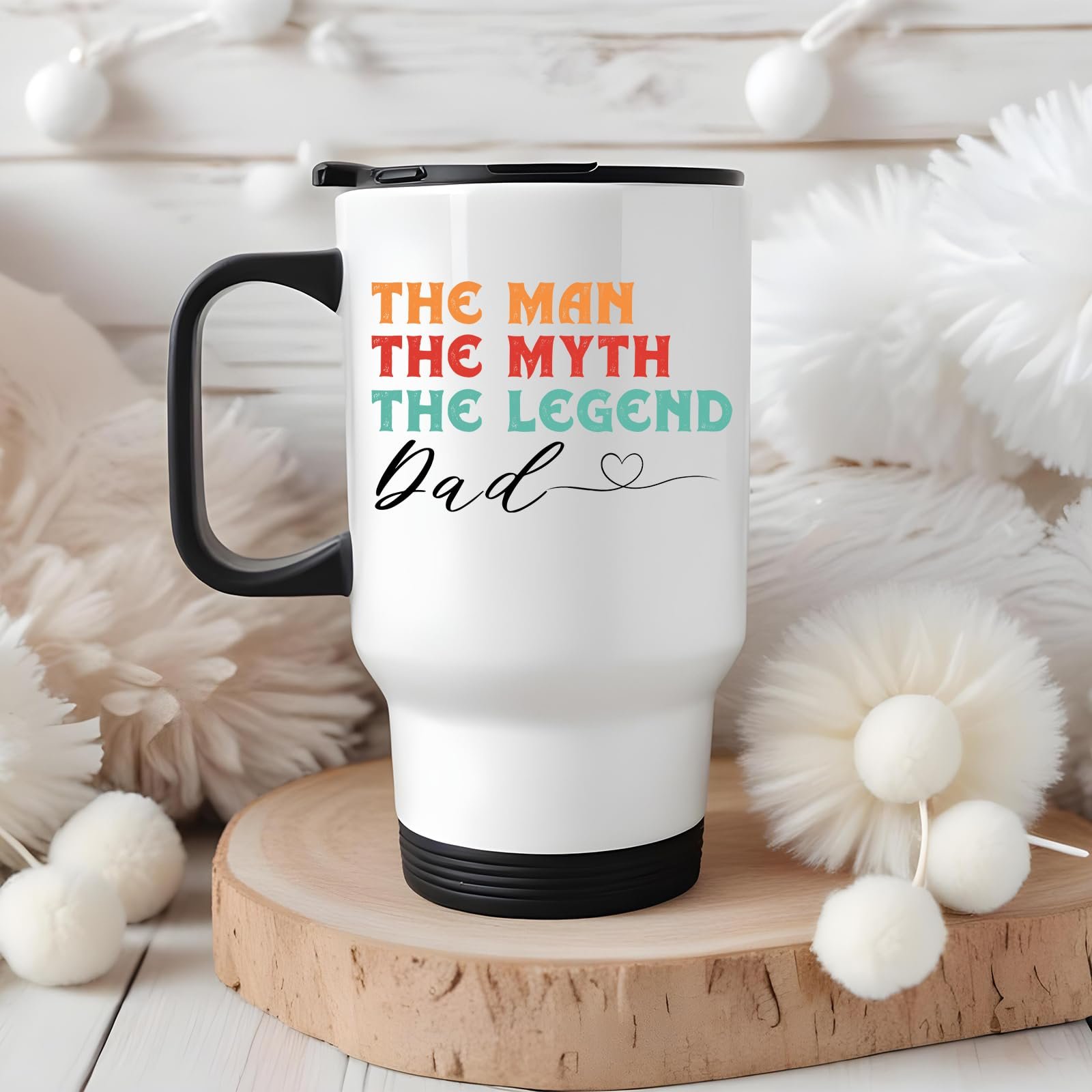 712z0ws0syl.jpg The Man the Myth Dad travel mug on a wooden slice with white pom-poms