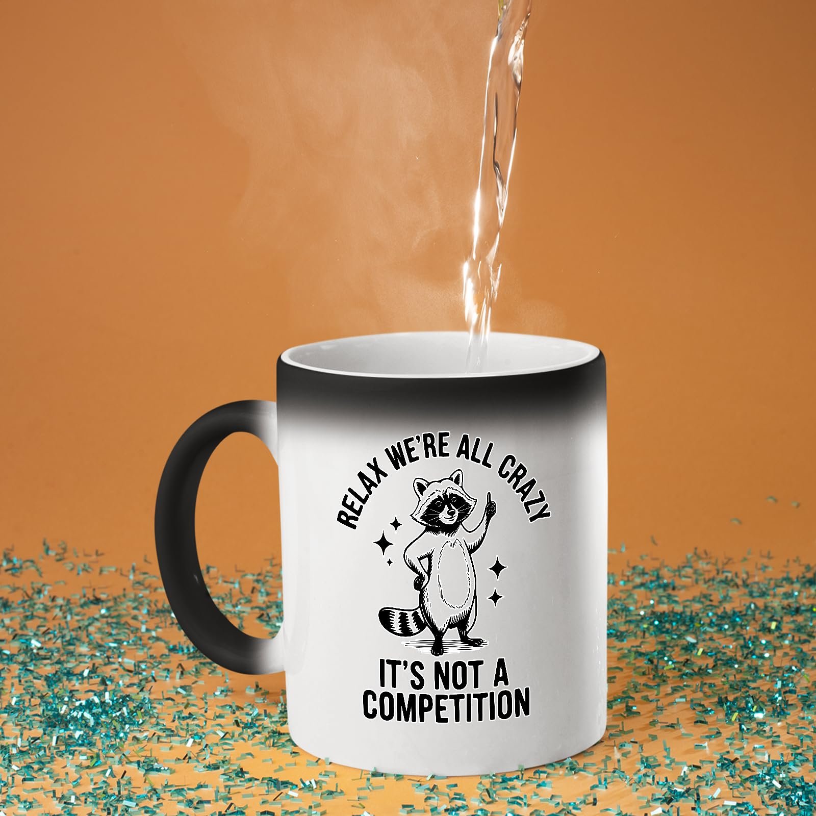 716u ac6qal.jpg Hot water poured into the Relax We’re All Crazy raccoon colour changing mug as the design appears