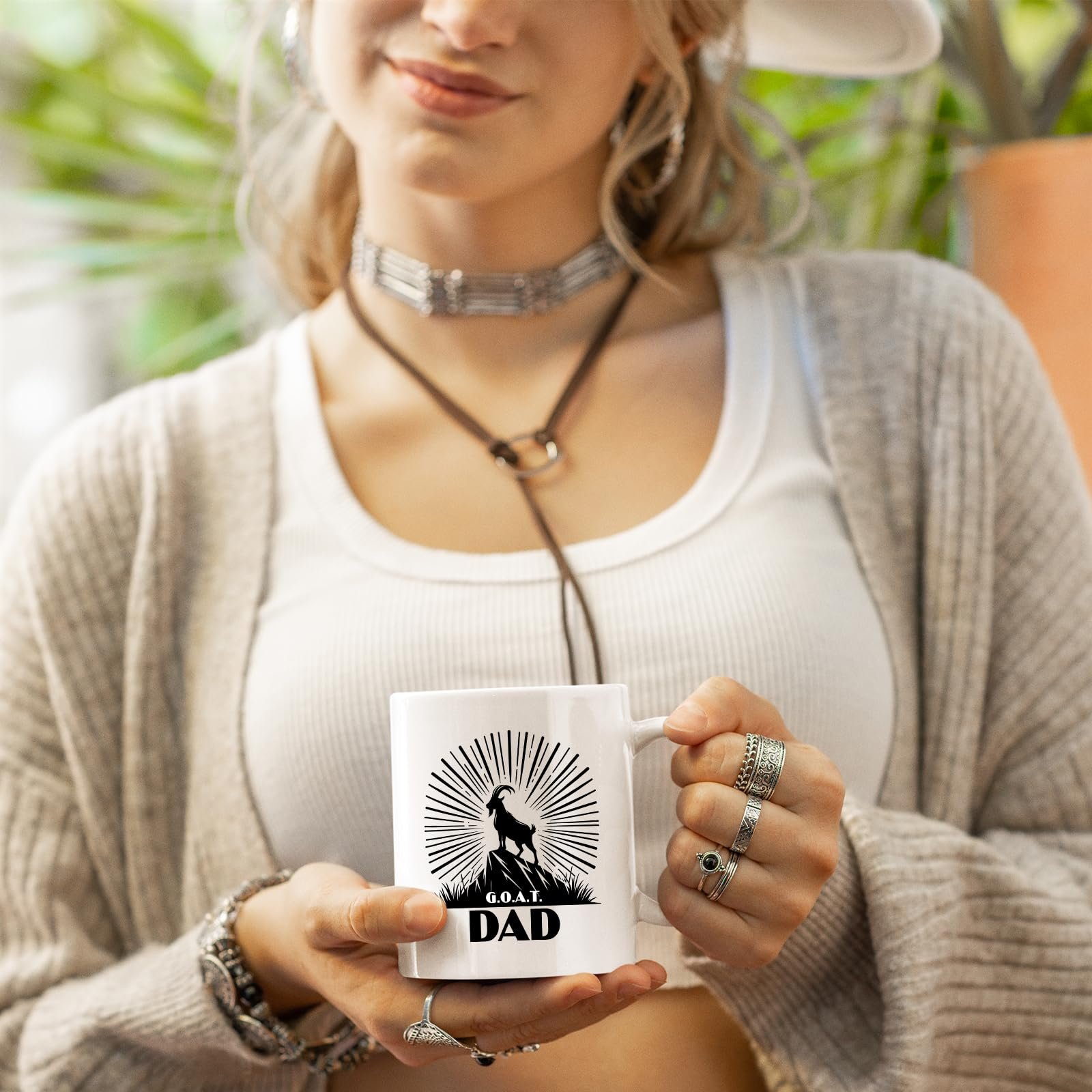 718kckq3trl.jpg Woman in a cardigan holding the GOAT Dad mug