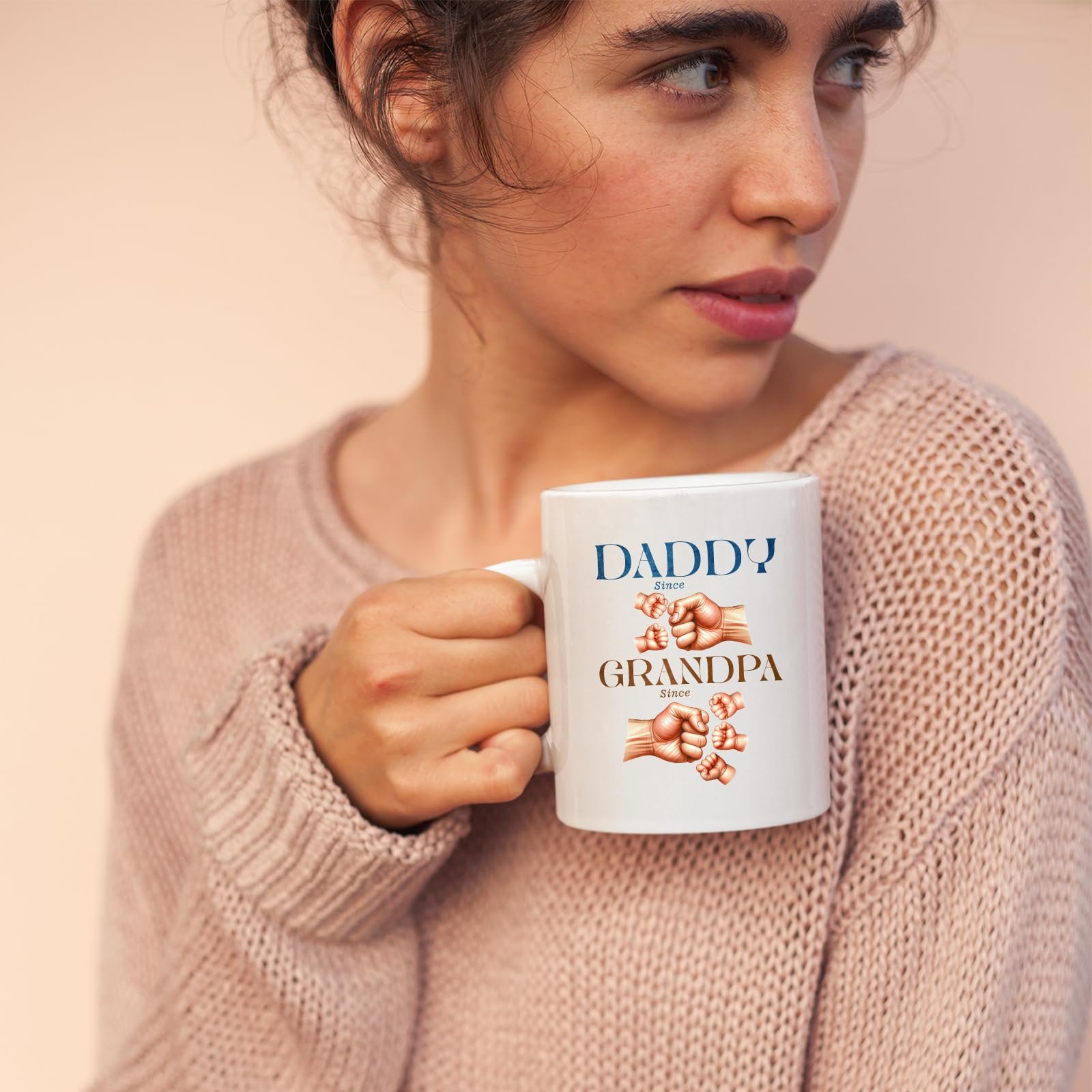 71b x eg3tl.jpg Woman in a pink jumper holding the Daddy and Grandpa fist bump mug