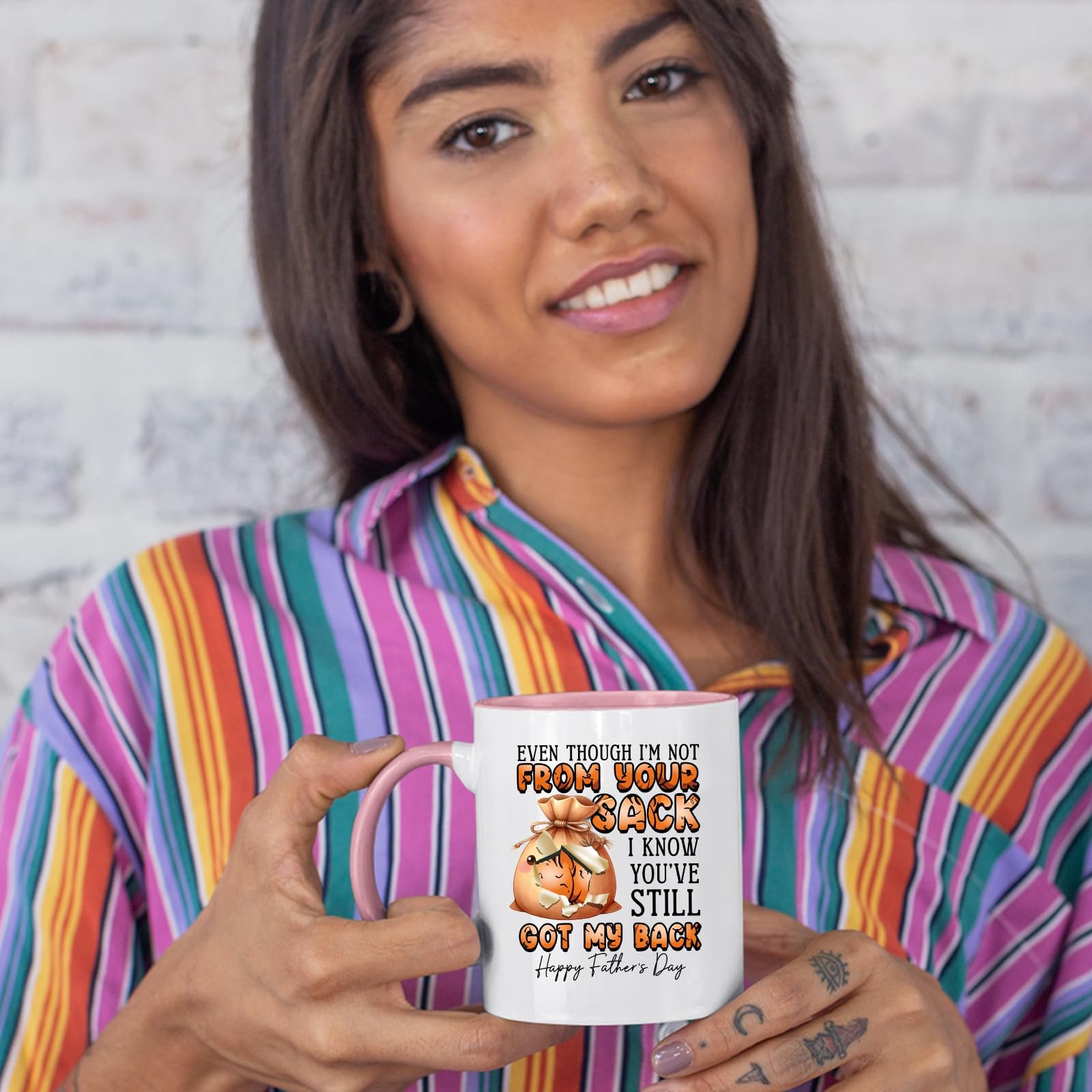 71demp2xlxl.jpg Woman in a striped shirt holding the Not From Your Sack colour handle mug