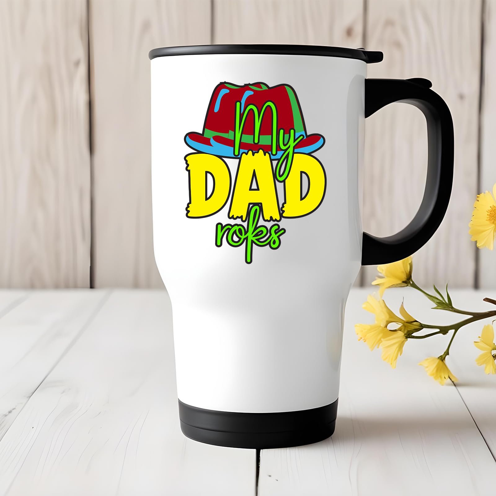 71eh40opt0l.jpg Travel mug with the My Dad Rocks design on a white table with yellow flowers