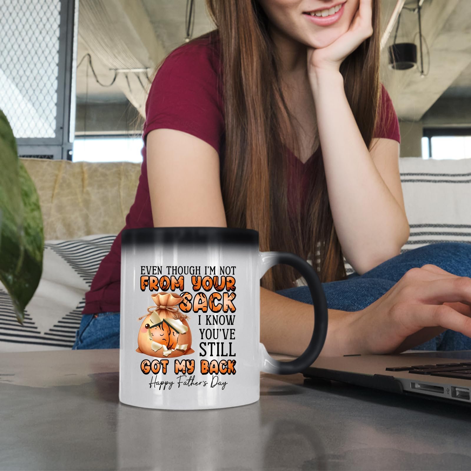 71eanqsaofl.jpg Woman at a laptop with the Not From Your Sack colour changing mug