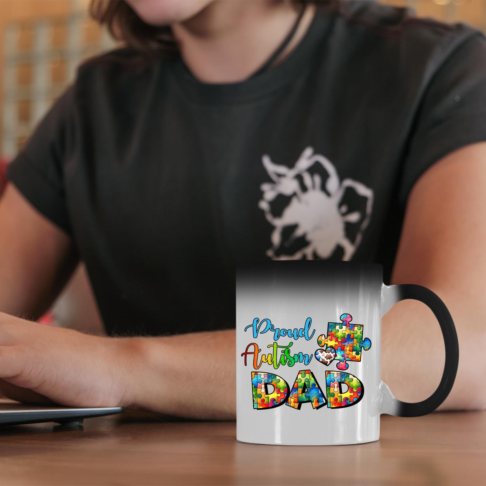 71fsahvq0zl.jpg Proud Autism Dad colour changing mug on a desk beside a laptop