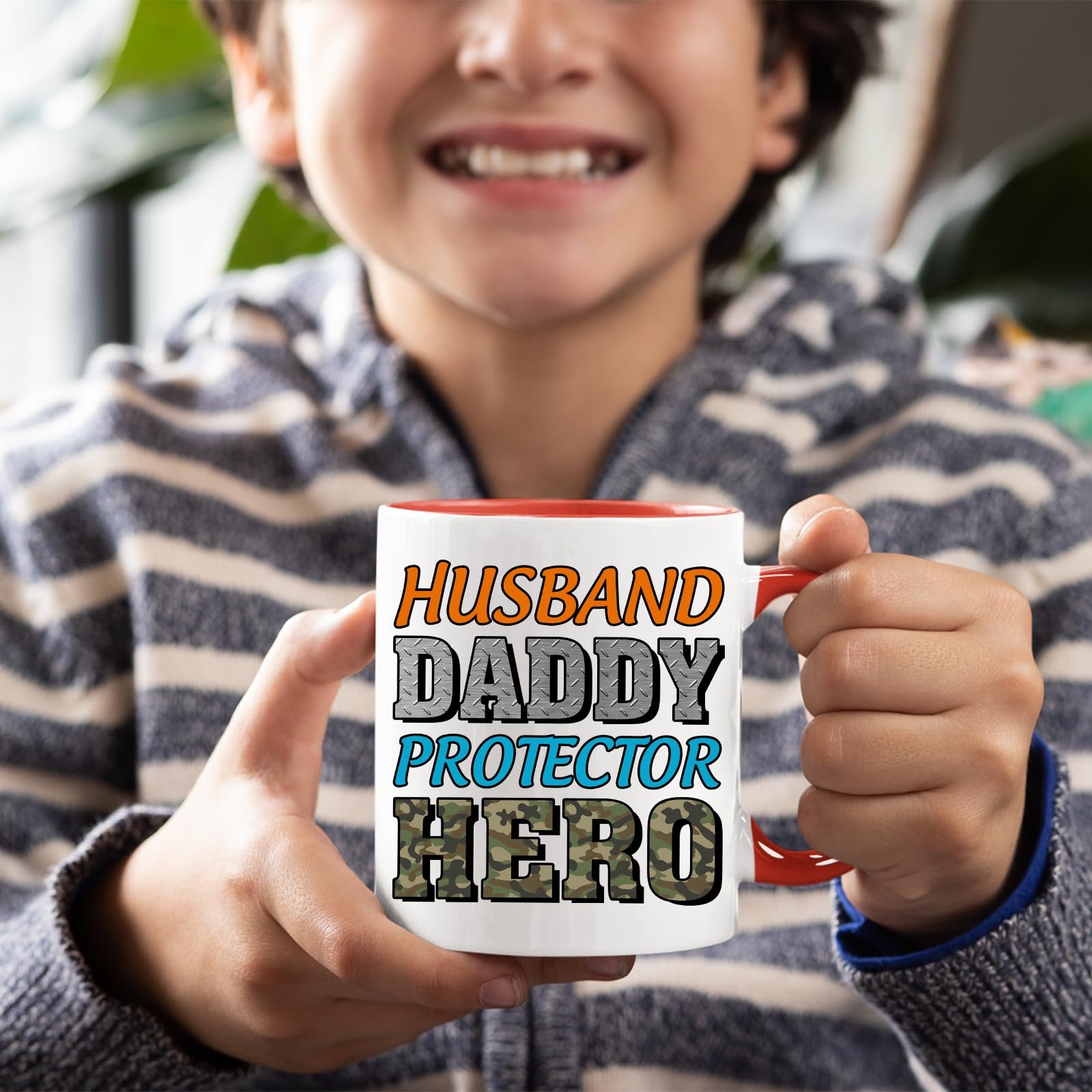 71fyico lzl.jpg Smiling child holding the Husband Daddy Protector Hero camo mug with a red handle
