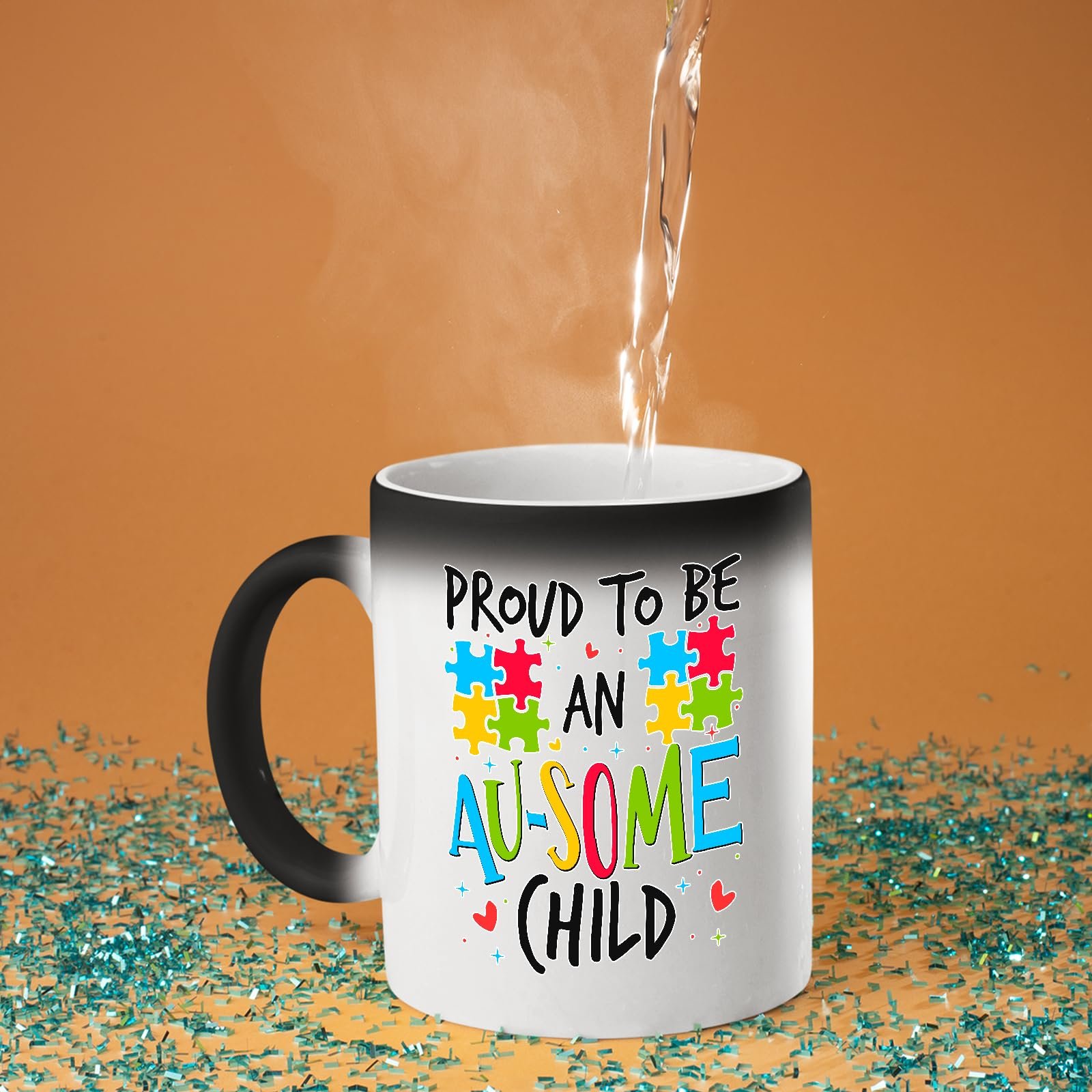 71gt gtjnfl.jpg Hot water poured into the Proud to Be an Au-Some Child colour changing mug as the design appears