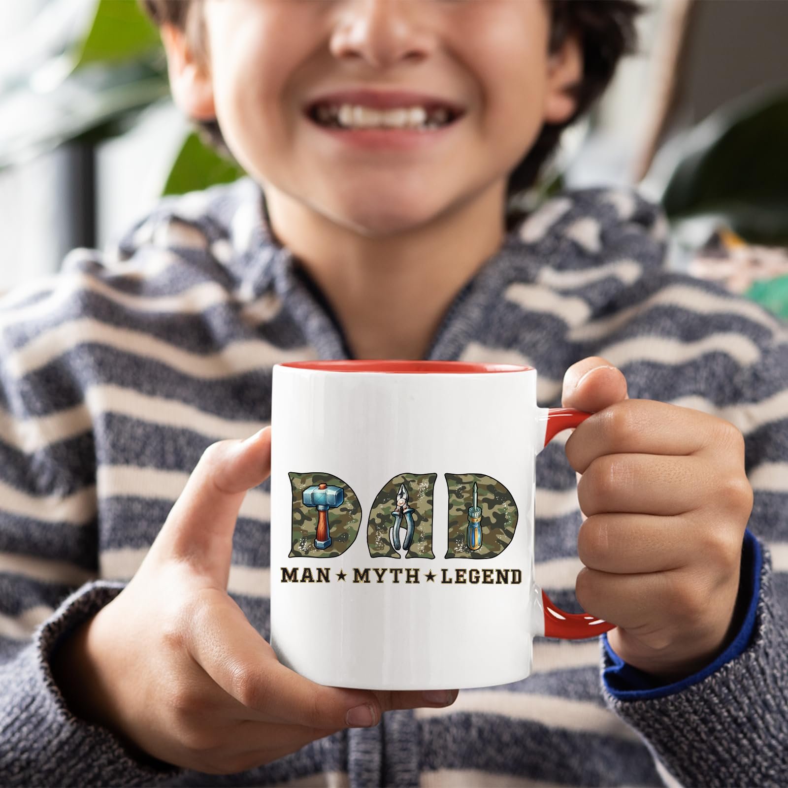 71hlqaztzml.jpg Smiling child holding the Dad Man Myth Legend tools mug with a red handle