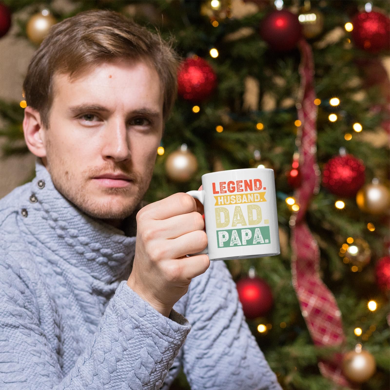 71htq0rolgl.jpg Man holding the Legend Husband Dad Papa mug in front of a Christmas tree
