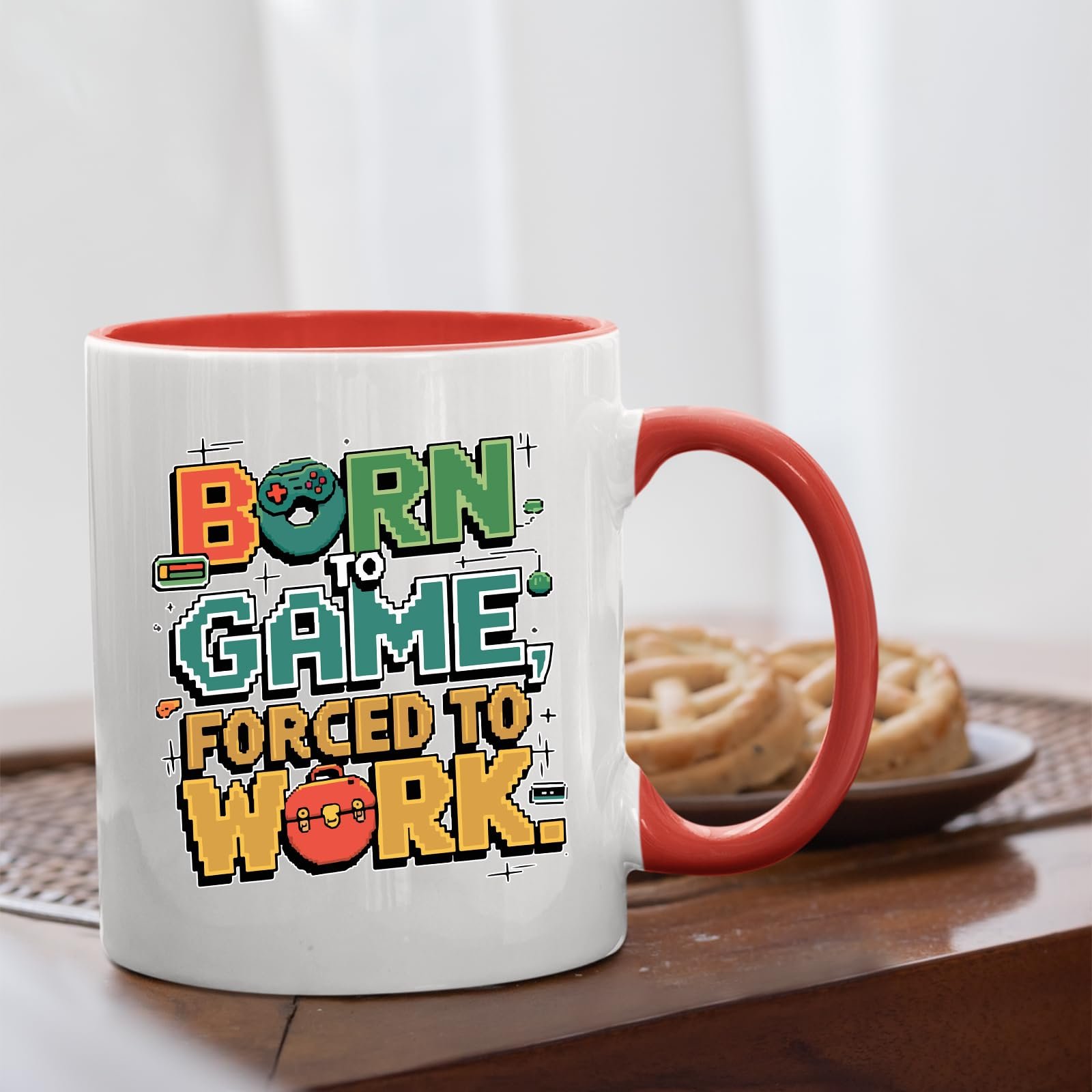 71ioy06iknl.jpg Born to Game mug with a red handle beside biscuits