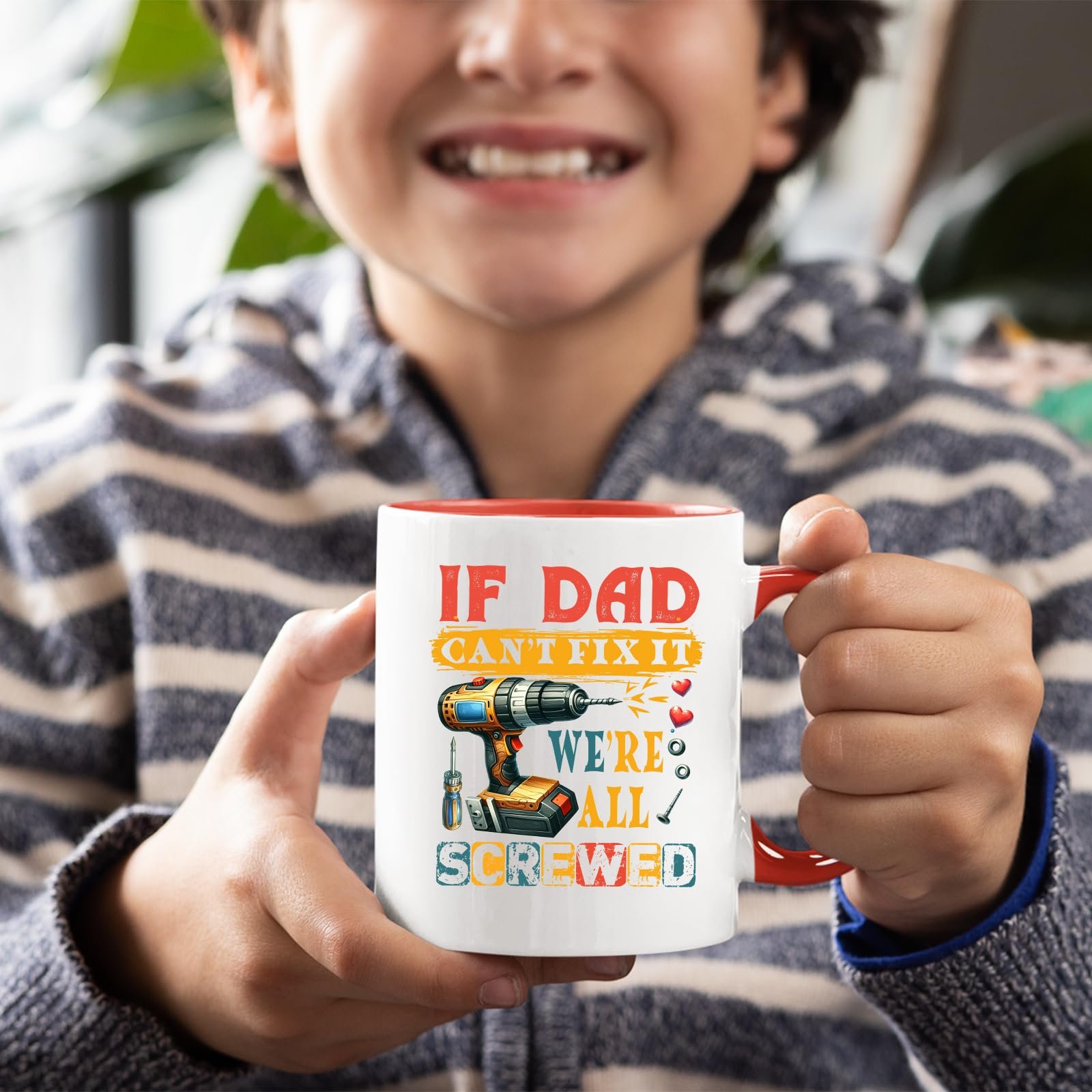 71kmjh0b9gl.jpg Smiling child holding the If Dad Can’t Fix It mug with a red handle