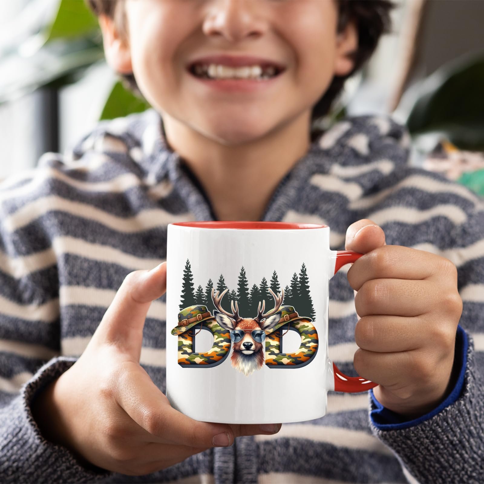 71kzbd0eosl.jpg Smiling child holding the Hunting Dad deer mug with a red handle