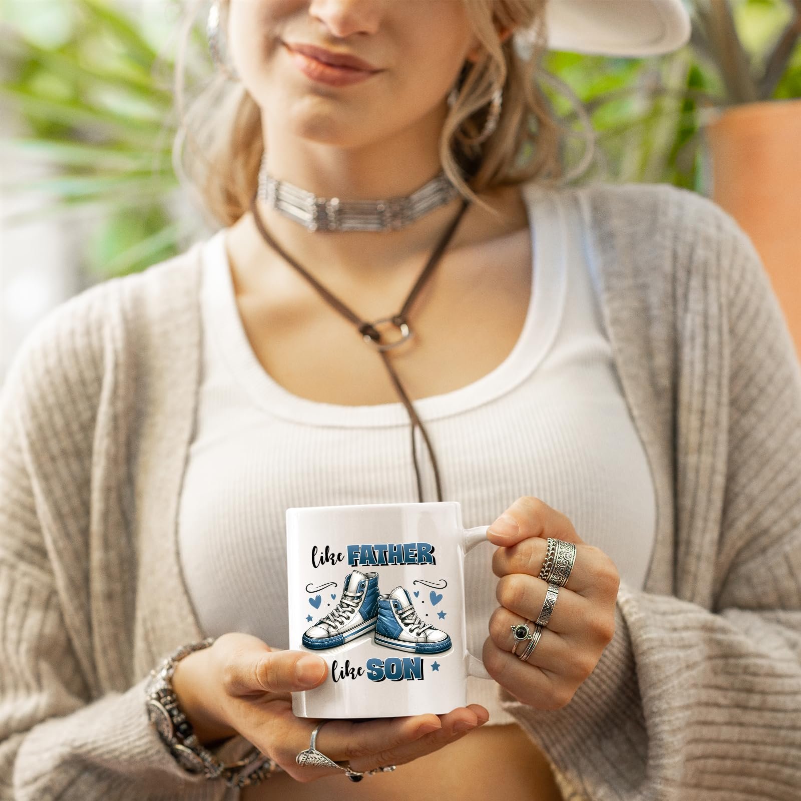 71ml1yajp0l.jpg Woman in a cardigan holding the Like Father Like Son mug