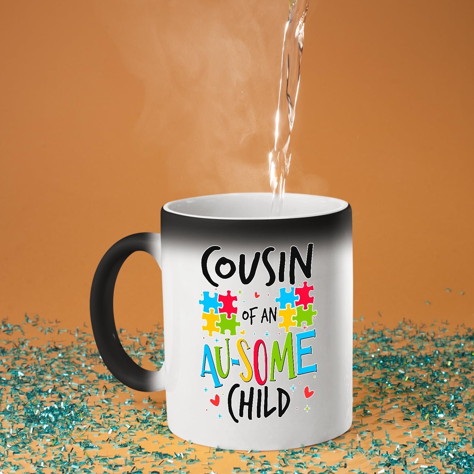 71mlydrdf5l.jpg Hot water poured into the Cousin of an Au-Some Child colour changing mug as the design appears