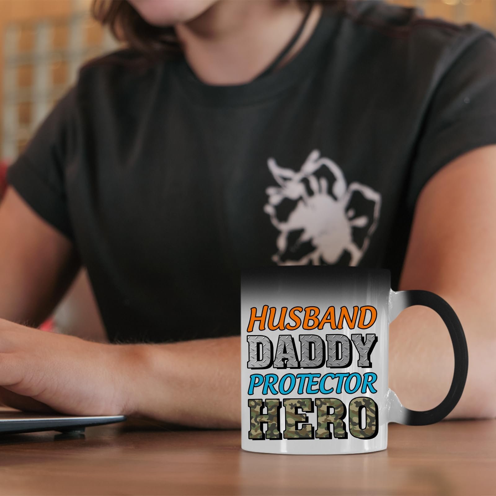 71uuny4byql.jpg Husband Daddy Protector Hero camo colour changing mug on a desk beside a laptop