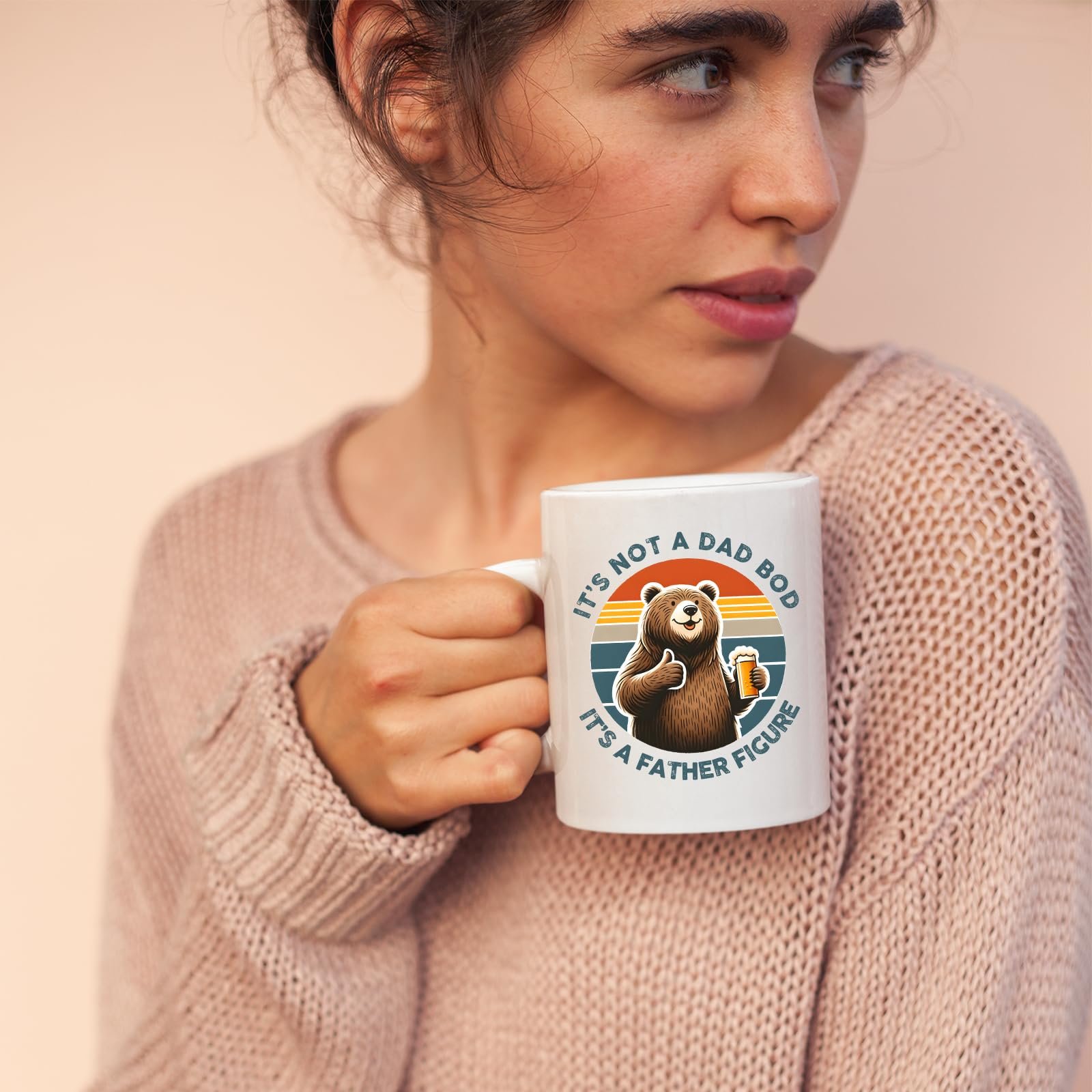 71am2e8bzul.jpg Woman in a pink jumper holding the Dad Bod bear mug