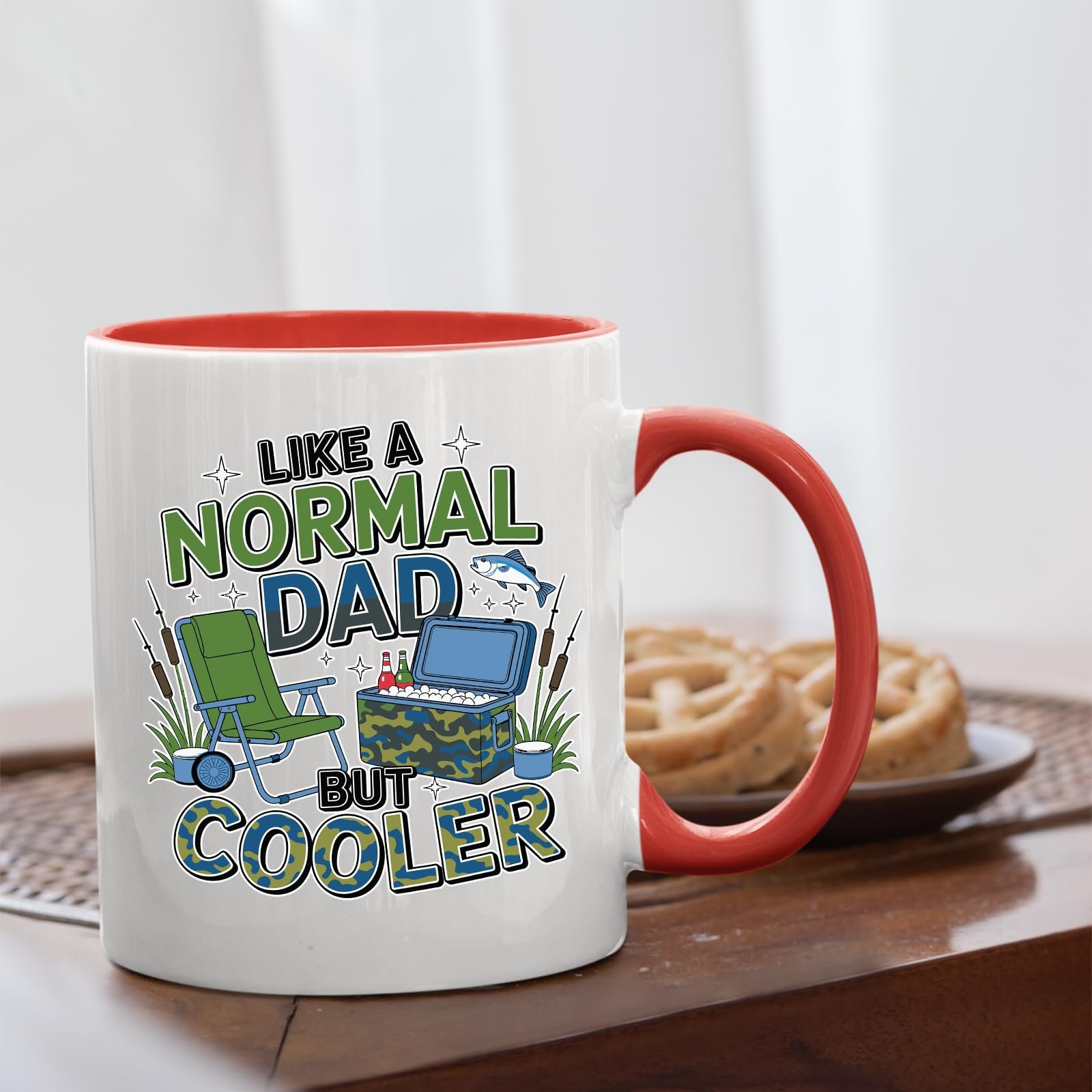71atzlyipwl.jpg Like a Normal Dad But Cooler mug with a red handle beside biscuits
