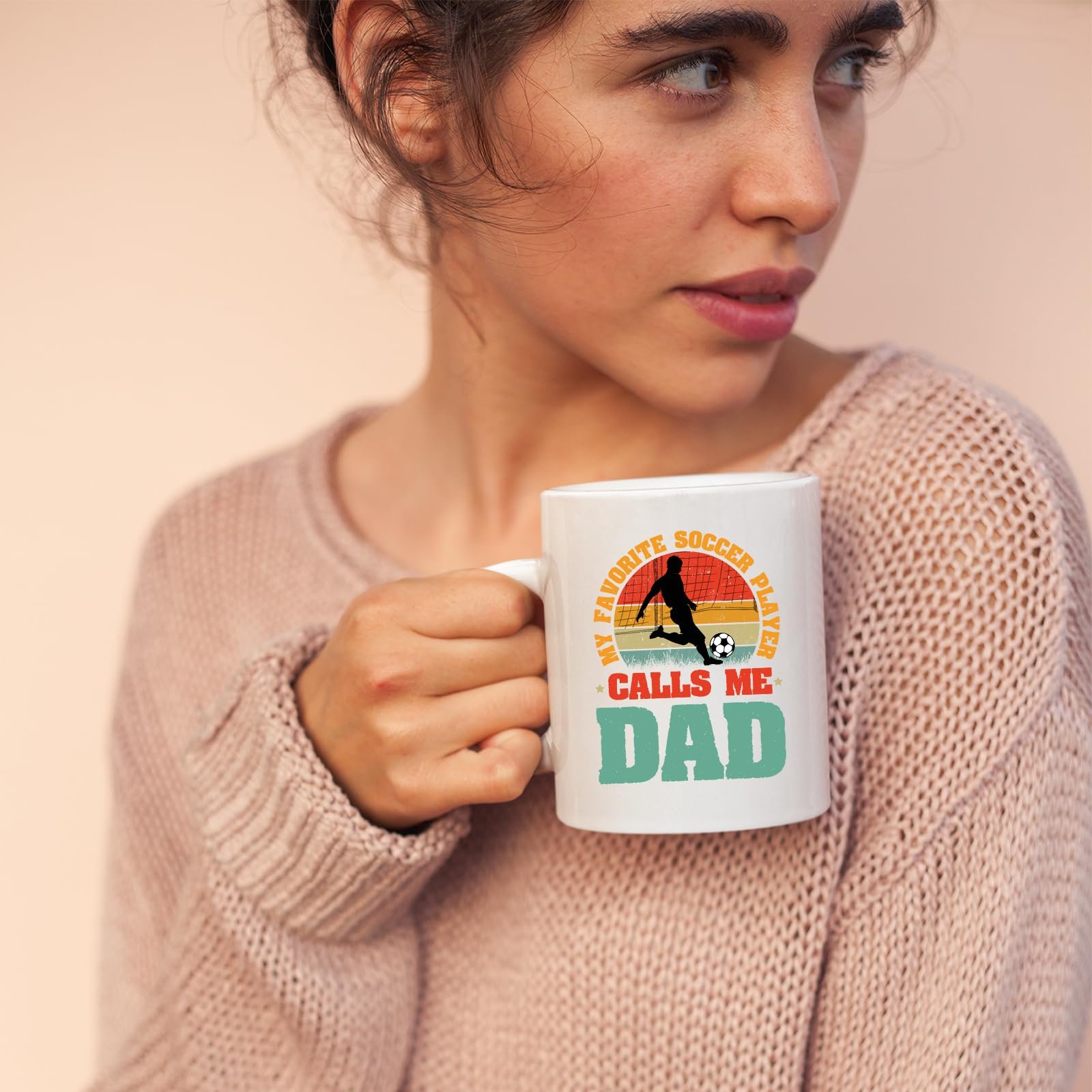 71coh0uik8l.jpg Woman in a pink jumper holding the Soccer Dad mug