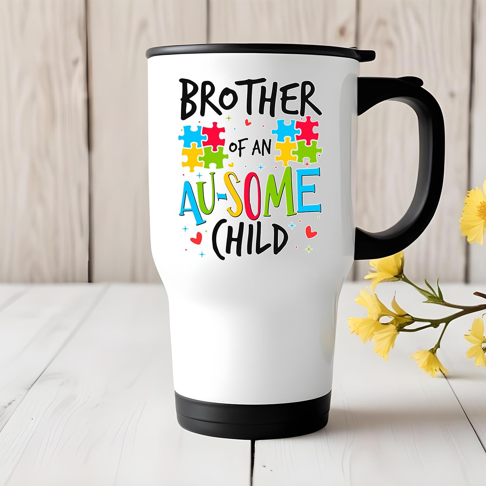 71cuqdw3o1l.jpg Brother of an Au-Some Child travel mug on a white wooden table with yellow flowers
