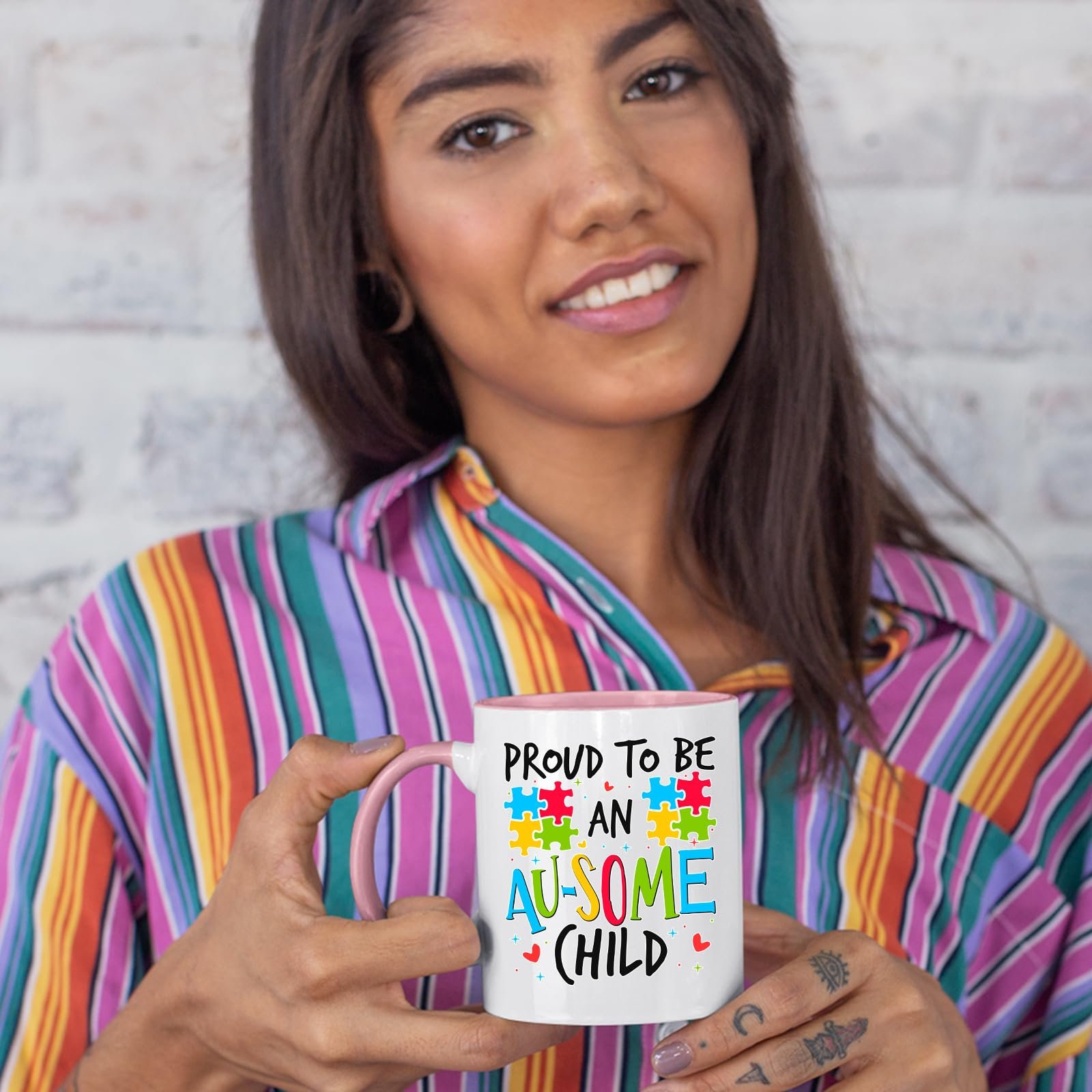 71fe9rlzr l.jpg Woman in a striped shirt holding the Proud to Be an Au-Some Child colour handle mug
