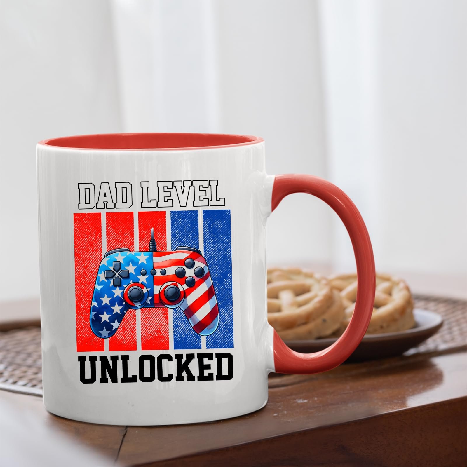 71lfcrjalcl.jpg Dad Level Unlocked mug with a red handle beside biscuits