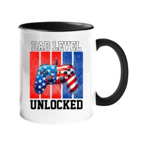 Colour handle mug with a stars-and-stripes game controller and “Dad level unlocked” – black handle and inside
