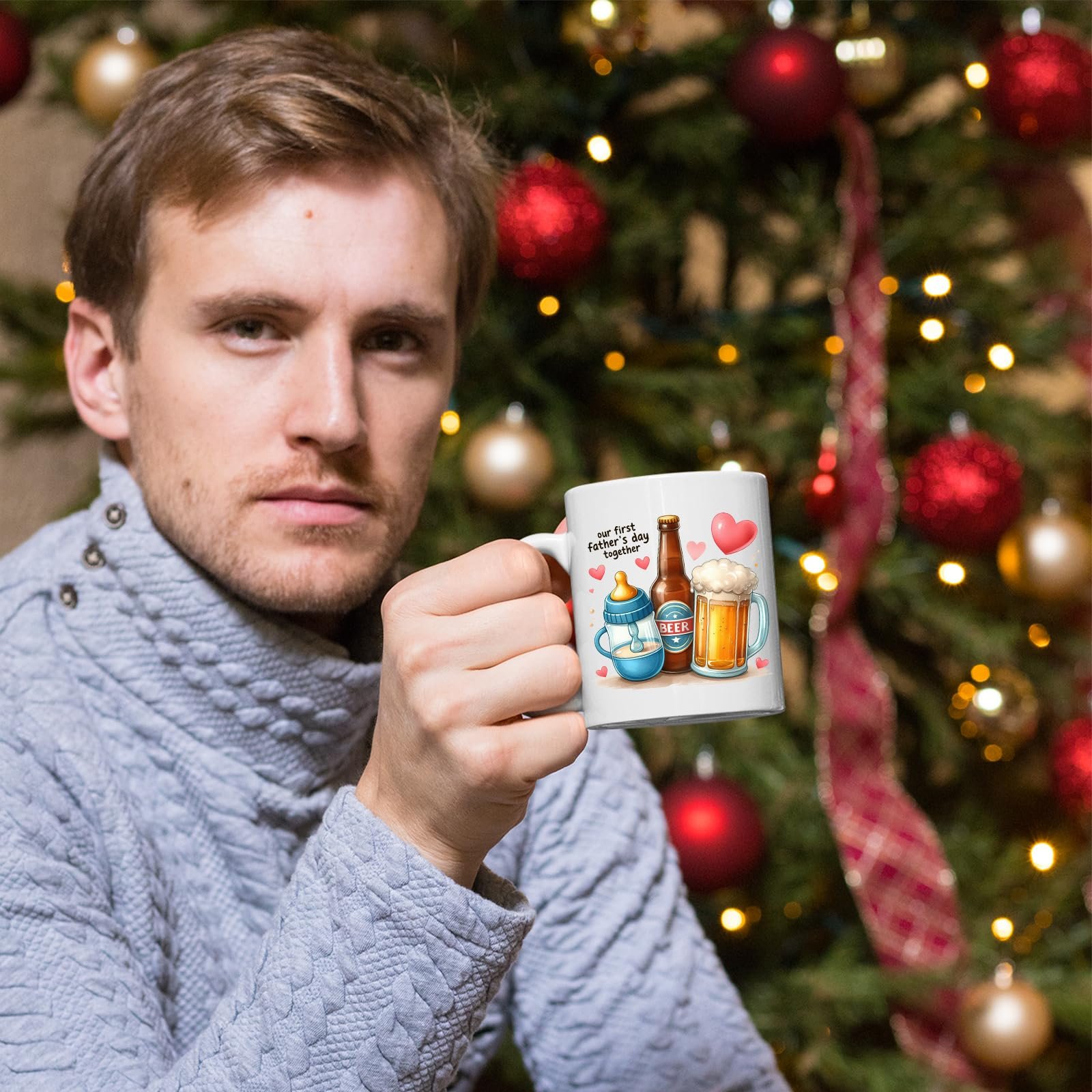 71m0jvhycul.jpg Man holding the First Father’s Day hearts mug in front of a Christmas tree