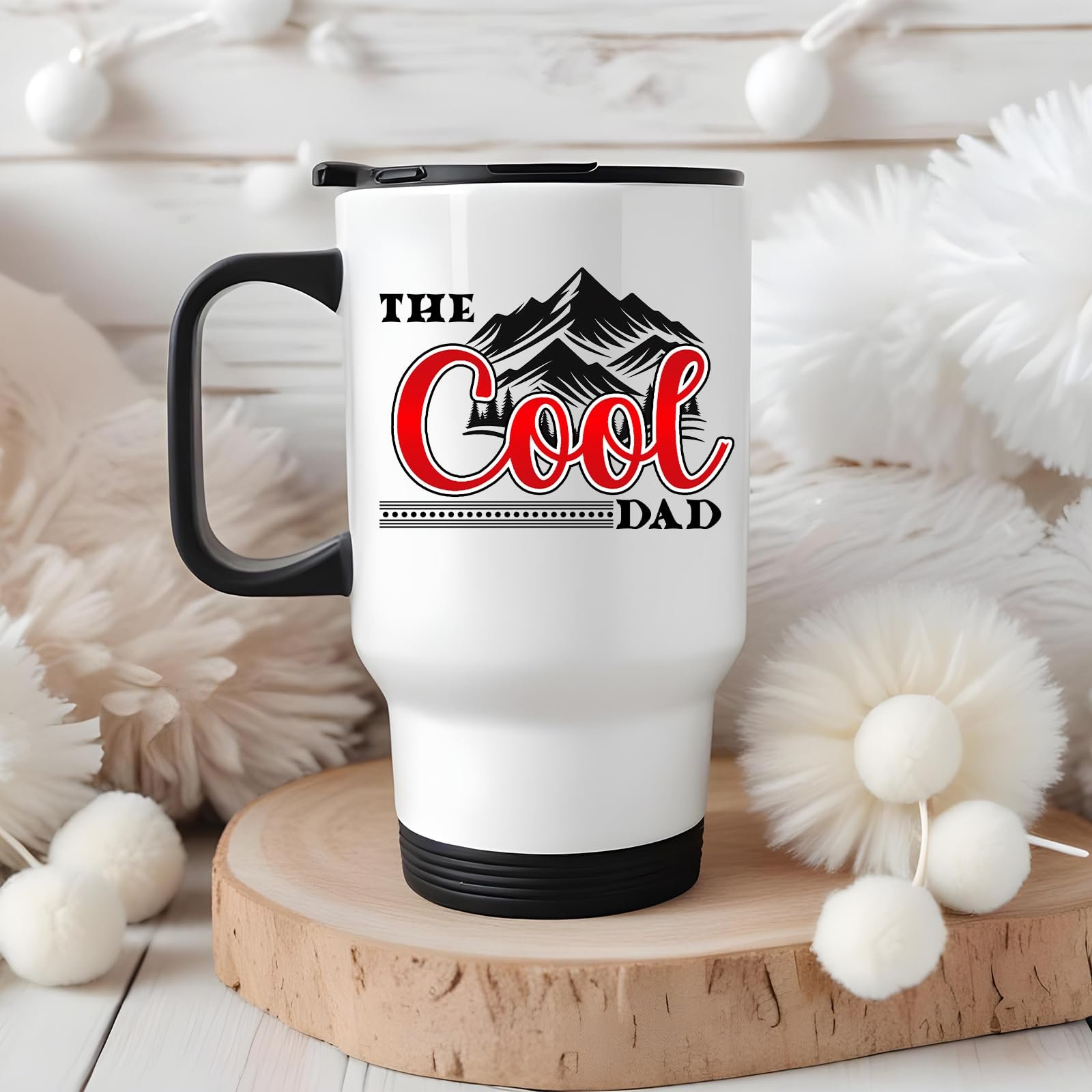 71nidtisvel.jpg The Cool Dad mountains travel mug on a wooden slice with white pom-poms