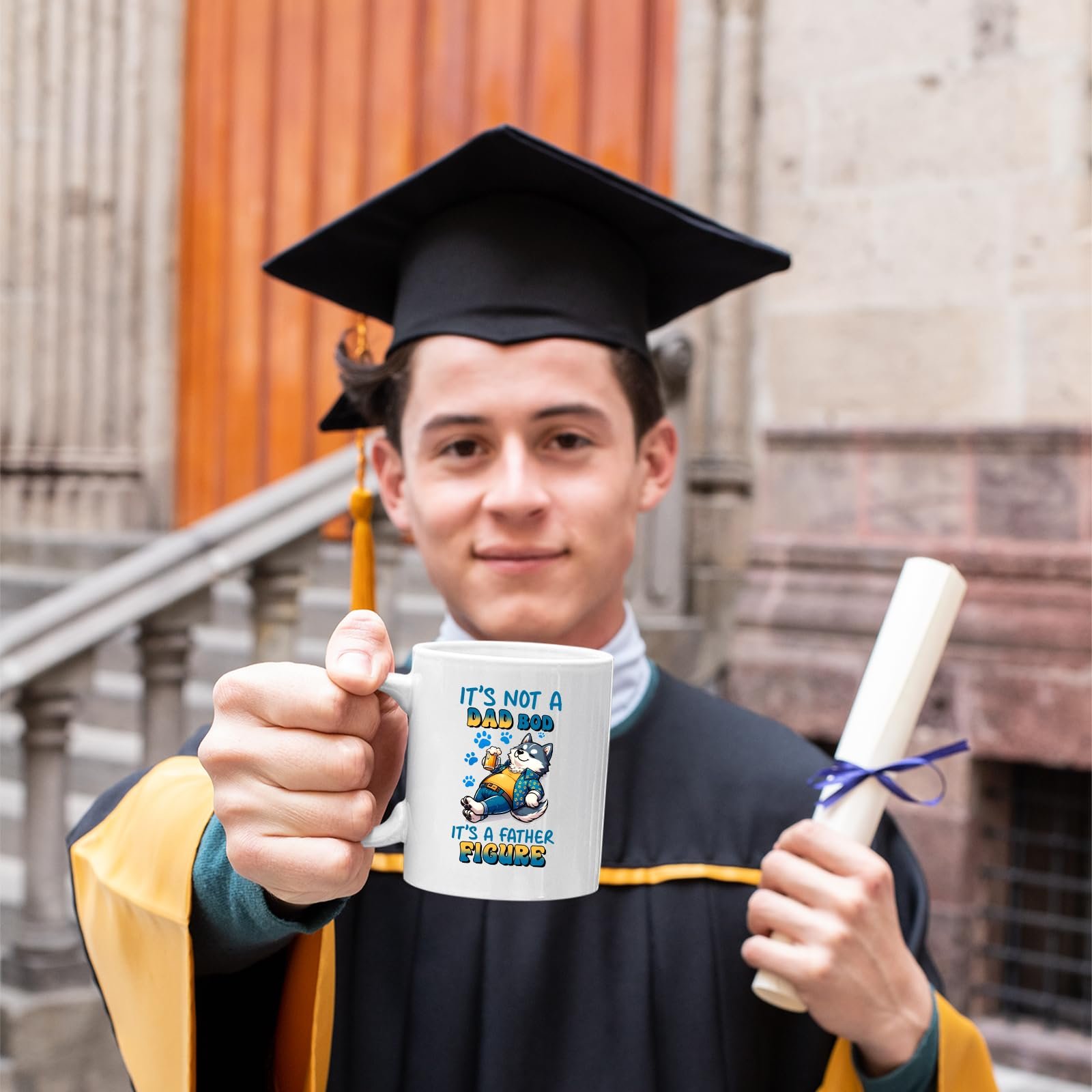 71wytawjk0l.jpg Graduate in cap and gown holding the Dad Bod husky mug