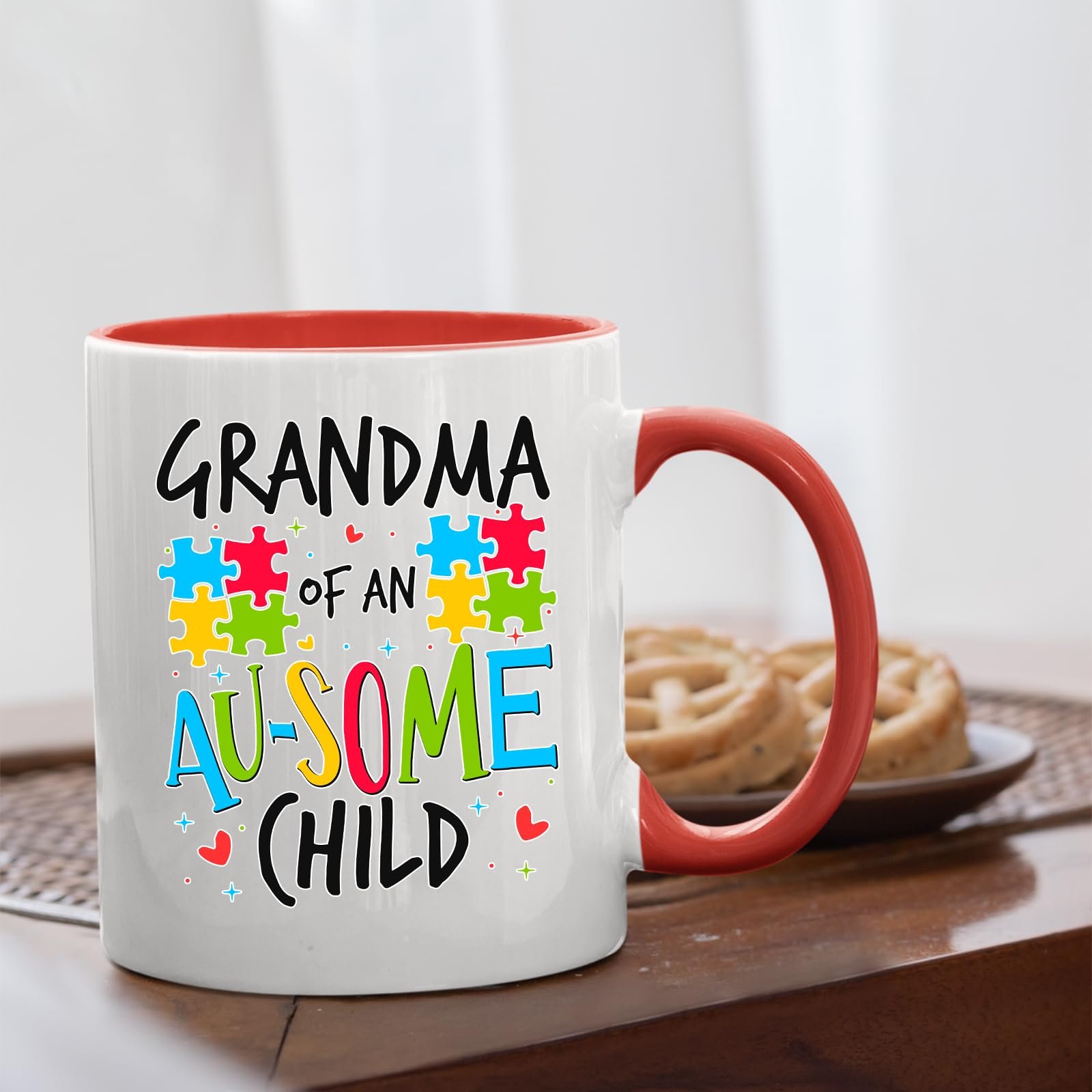 71wry4myfdl.jpg Grandma of an Au-Some Child mug with a red handle beside biscuits