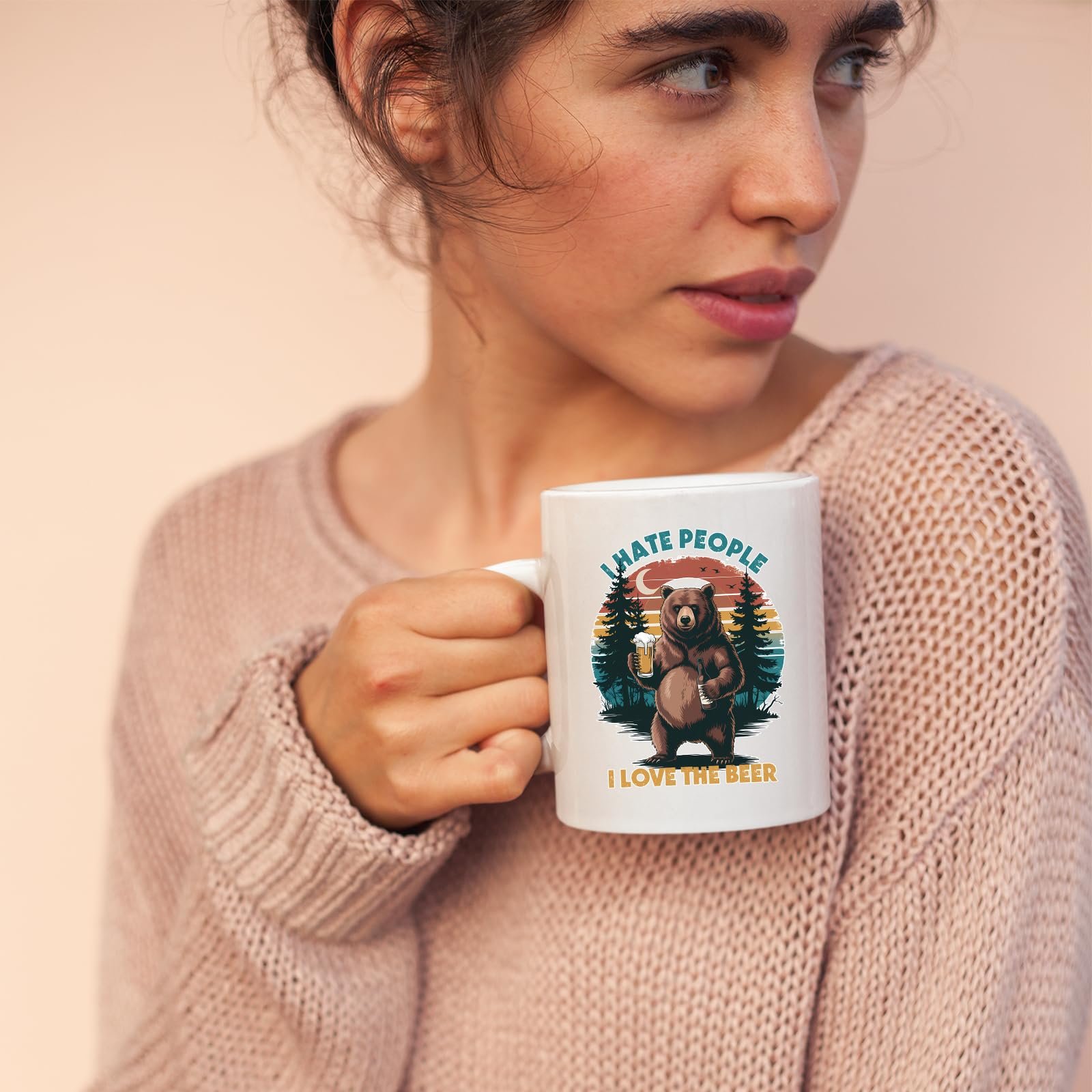 71yoymipsal.jpg Woman in a pink jumper holding the beer-loving bear mug