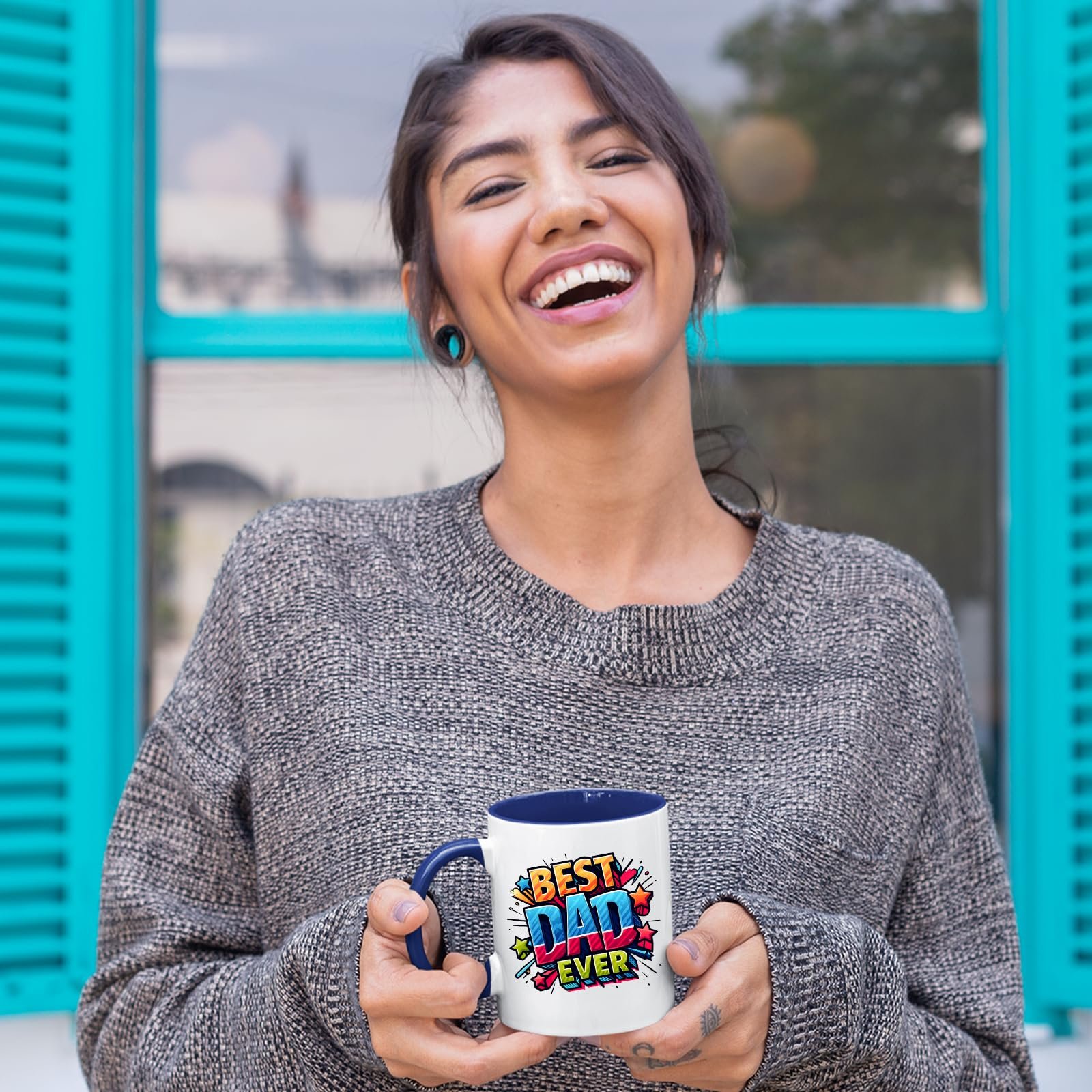810in8zjfll.jpg Laughing woman holding the Best Dad Ever comic mug with a dark blue handle