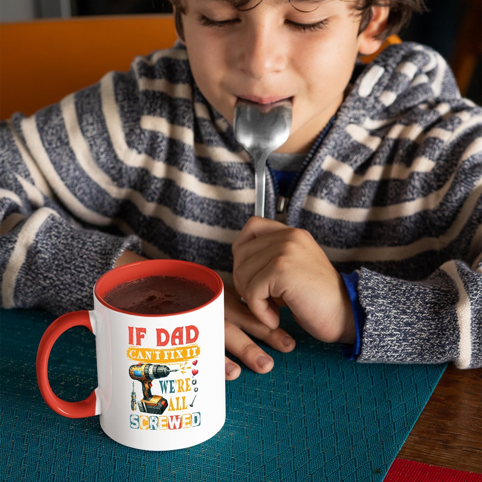 816wxpm2n2l.jpg Child with a spoon next to the If Dad Can’t Fix It mug with a red handle