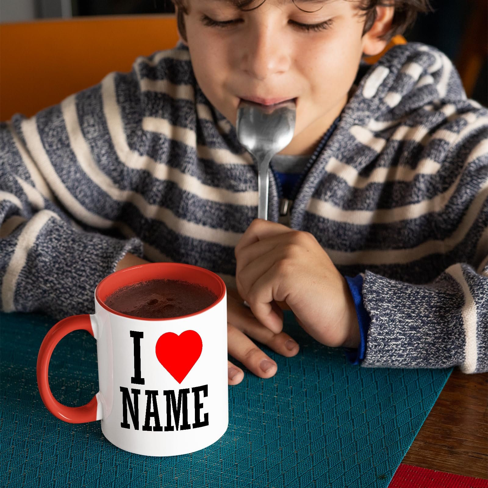 81jhiwlwc5l.jpg Boy with a spoon next to an I love name mug with a red handle