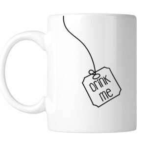 White mug with a hanging tea-bag tag that says “Drink Me” in simple black line art, handle on the left